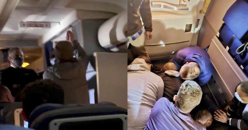 Passengers team up to restrain threatening man in US flight