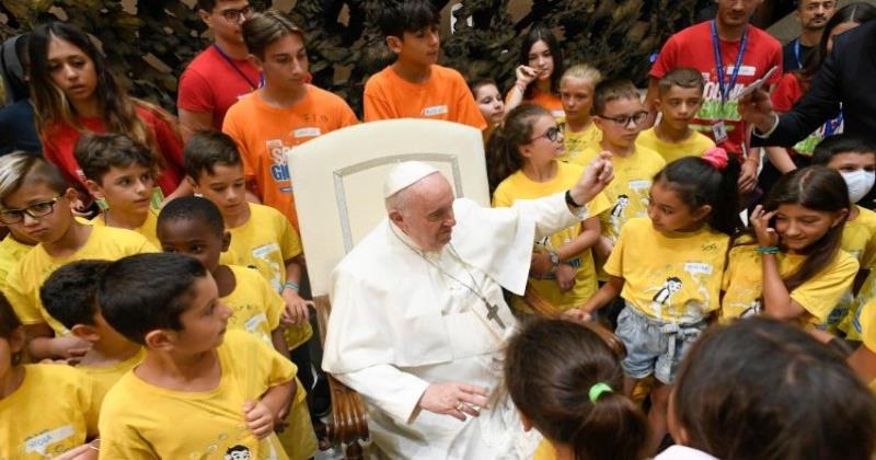 Pope Francis greets children attending Vatican summer camp