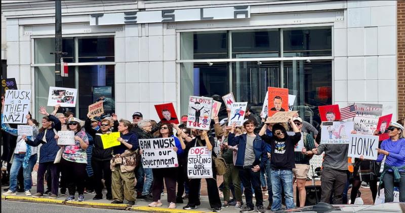 Protesters Rally Outside Washington Tesla Dealership Against Elon Musk's Government Role