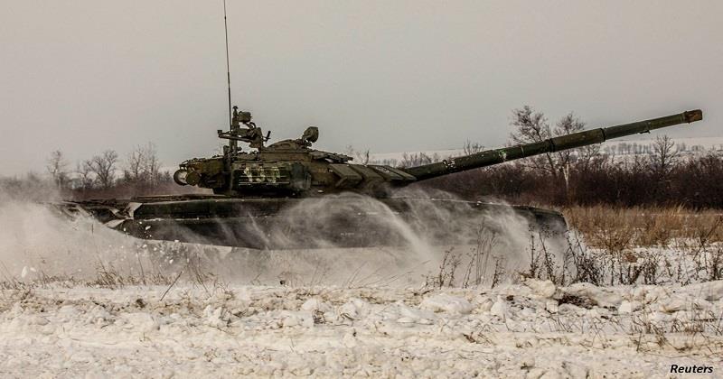 Russian troops withdraw on completion of drills in Belarus, agency reports